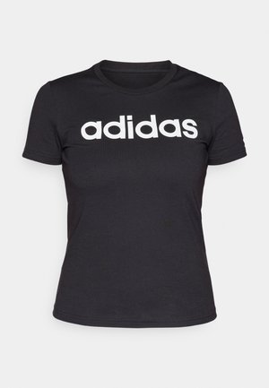 Svart bomull t-skjorte med korte ermer, med et stort hvitt "adidas"-logo over brystet. Klassisk rund hals, glatt tekstur.