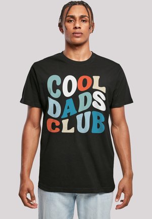 Black cotton t-shirt featuring the text "COOL DADS CLUB" in multicolored, playful fonts. Short sleeves and round neckline.