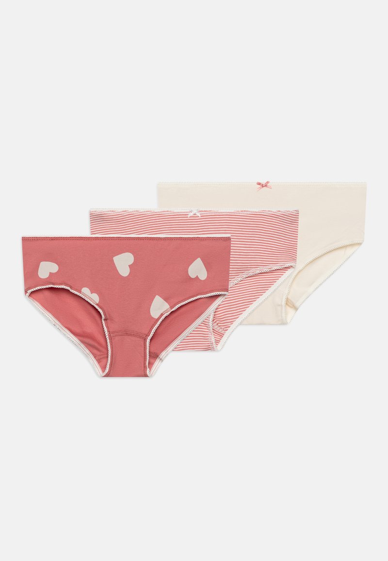 Trois paires de culottes pour femmes : une rose unie avec des cœurs blancs, une rayée rose et blanche, et une crème unie avec un petit nœud rose.