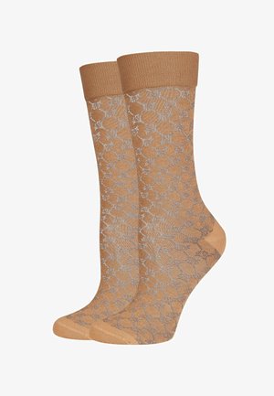 Tan socks with a patterned design in light gray. Ribbed top with medium-height fit. Soft texture suitable for casual wear.