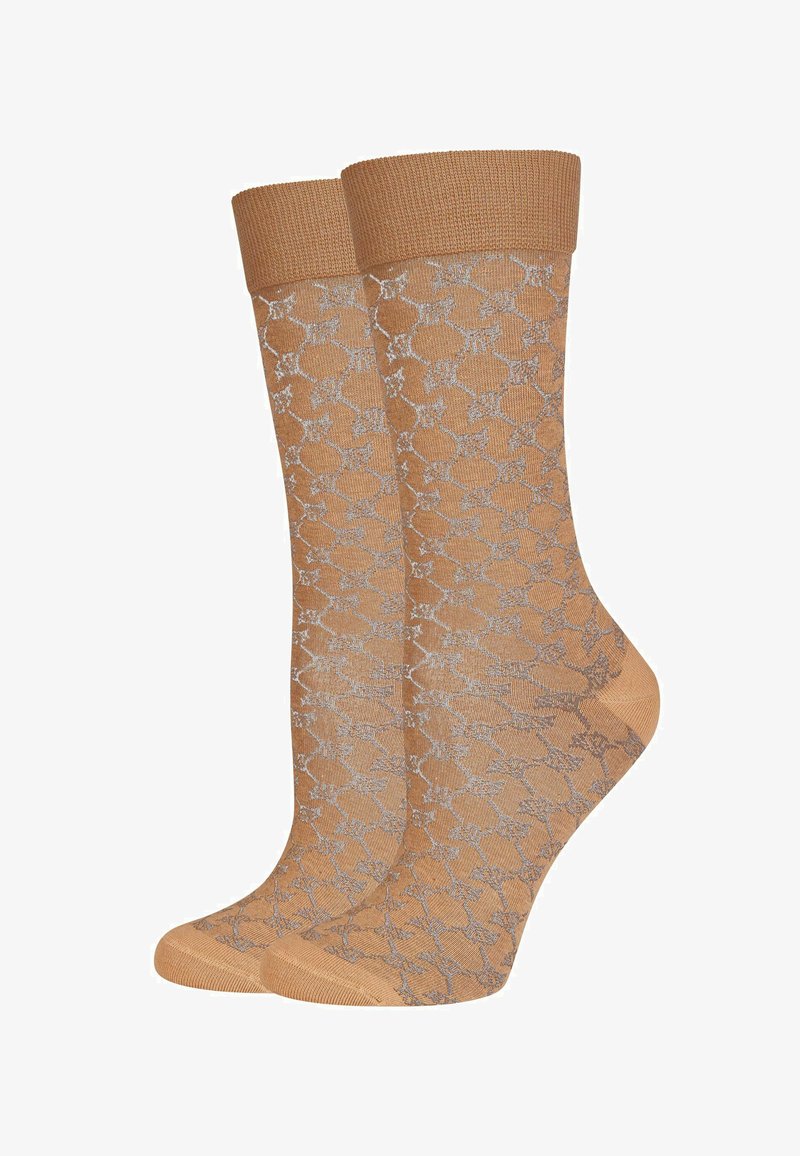Calze color sabbia con un design a fantasia in grigio chiaro. Parte superiore a costine con altezza media. Tessuto morbido adatto per un look casual.