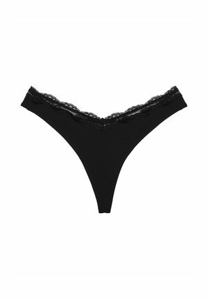 Black lace-trimmed thong underwear featuring a scalloped lace waistband. Made from soft fabric with a smooth texture. Minimalistic design.
