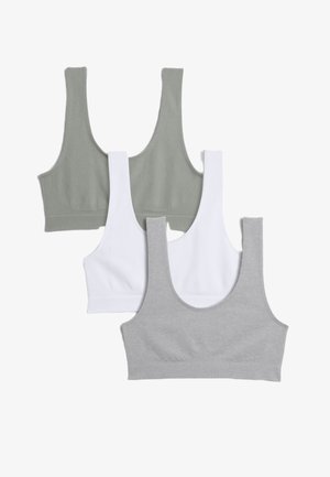 Tre sømløse braletter i lys grå, hvid og salviegrøn. Hver bralette har en bred elastik og brede stropper, lavet af blødt bomuldsblandingsstof.
