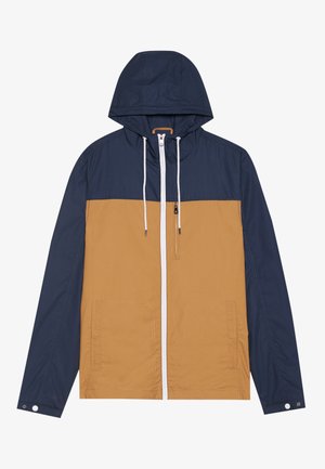 Bundová farba-jacket so námorníckou kapucňou a rukávmi, telom v pieskovej farbe, bielym zipsom a prednými vreckami s hladkou textúrou.