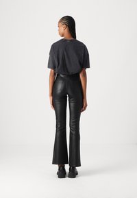 Object OBJBELLE COATED FLARED PANT  - Püksid - black