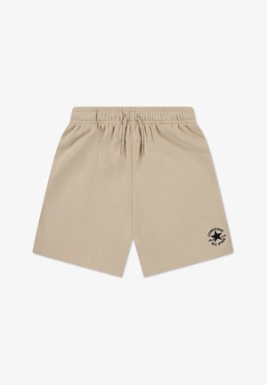 Pantaloncini di cotone beige con fascia elastica in vita e coulisse. Presentano un logo a stella nera e un testo sulla parte inferiore sinistra.