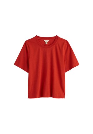 T-shirt rouge à manches courtes avec col rond, en tissu lisse, présenté à plat sur un fond blanc.