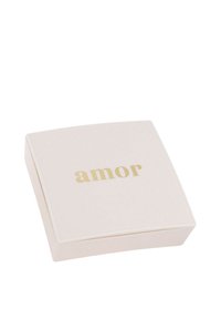 Caja cuadrada, de color rosa pálido con una textura suave, que presenta la palabra "amor" en letras metálicas doradas en la parte superior. Diseño simple y elegante.