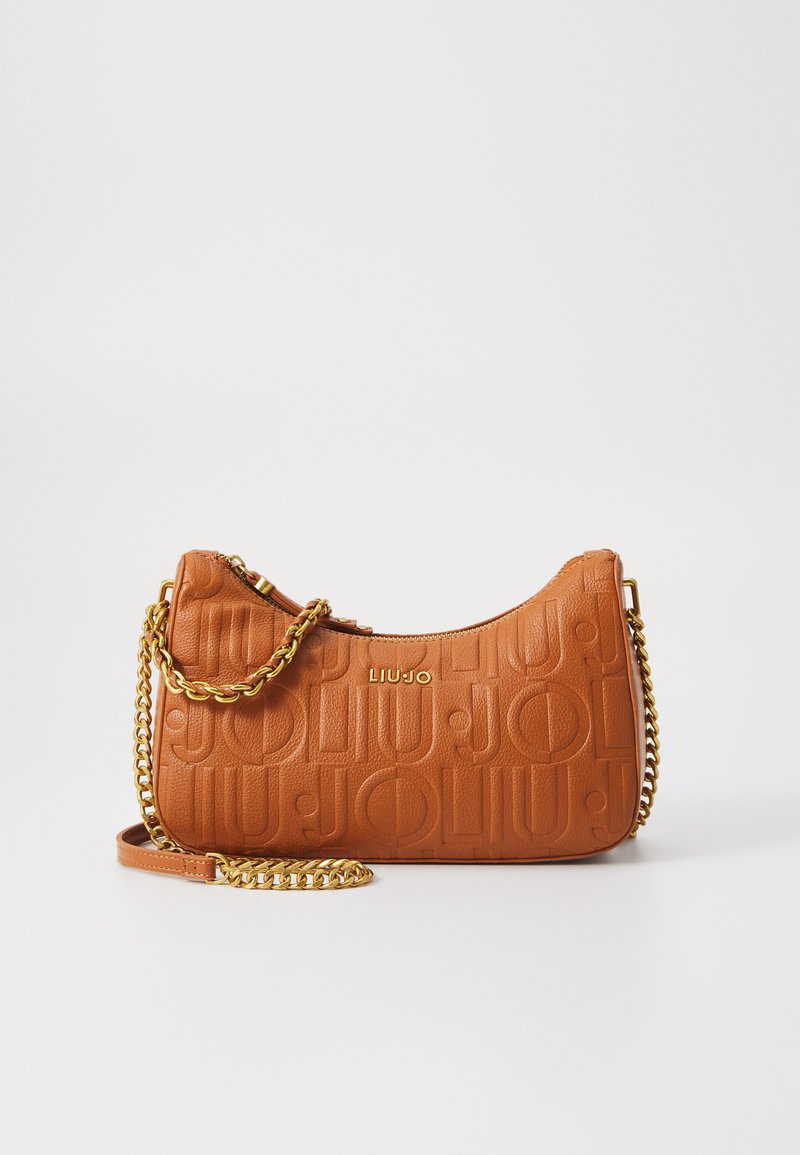 Tan embossed leather handbag with chain strap, featuring a zipper closure and prominent logo detail. Smooth texture and rounded shape.