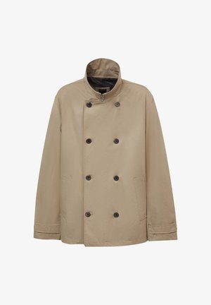 Beige double-breasted jacket made of smooth fabric featuring a stand collar, black buttons, and side pockets.