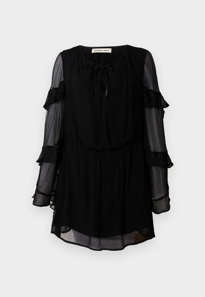Black dress made of lightweight fabric, featuring a round neckline, tied detail, and ruffled long sleeves. Flowy silhouette with a gathered waist.