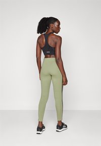 adidas Sportswear FUTURE ICONS THREE STRIPES LEGGING - Punčochy - tent green
