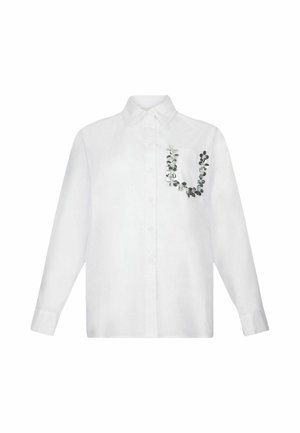 Witte overhemd met lange mouwen, een knoopsluiting aan de voorkant en een zak, met een decoratief metallic bladontwerp op het zakgebied.