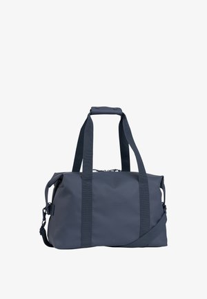 Dark gray duffel bag with dual top handles, padded grip, and adjustable shoulder strap, shown against a white background.