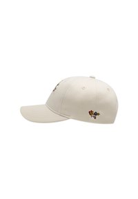 Kremfarget bomulls-baserballcap med buet brem og broderte blomsterdetaljer i rødt, blått og gult på front- og sidepanelene.