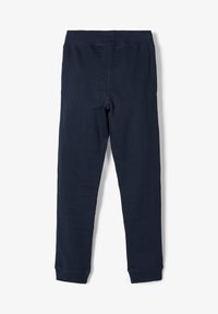 Dunkelblaue Leggings aus weichem Stoff, mit einem dehnbaren Bund und einer körpernahen Passform. Die Abschlüsse sind ordentlich gesäumt für eine elegante Optik.