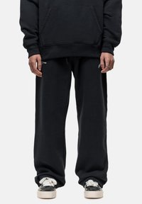 ANT - Jogginghose - black