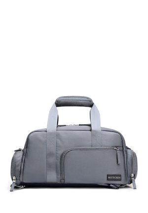Borsa da viaggio grigia morbida con doppi manici, tasca frontale con cerniera, scomparti laterali con cerniera e etichetta del marchio "Wittchen" sulla tasca frontale.