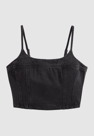 Μαύρο κοντό τοπ από τζιν με λεπτούς ρυθμιζόμενους ιμάντες ώμων και κάθετη ραφή στη λεπτομέρεια.