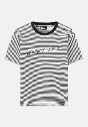 Black and white striped t-shirt with a round black neckline. Front features distorted text graphic in white and gray across the chest.