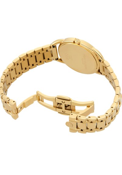 Gold metal link watch with open butterfly clasp and smooth round back case, showing brand and model details engraved.