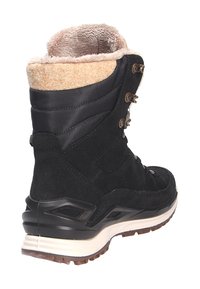 Zwarte suède en synthetisch stoffen enkellaars met een lichtbeige faux fur kraag, metalen oogjes en een gestructureerde rubberen zool.