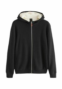 Mustha musta kapuutsiga, millel on kunstkarusnahast vooder, soonikuga varrukad ja äär; sisaldab hõbedast tõmblukk ja peenelt tekstureeritud kangast.