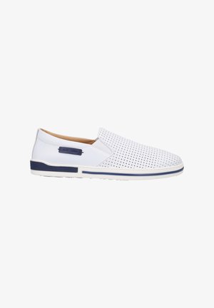 White slip-on shoes featuring perforated upper, a navy accent on the sole, and a textured insole. Clean design with minimal branding detail.