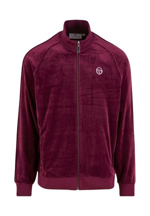 Bordowa, aksamitu kurtka na zamek z kołnierzem stójkowym, ściągaczami przy rękawach, dwiema bocznymi kieszeniami i logo na klatce piersiowej.