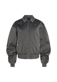 Giacca bomber grigia realizzata in materiale lucido, con motivo a pois, chiusura con zip e polsini ed orlo elasticizzati. Inclusi due taschini frontali.