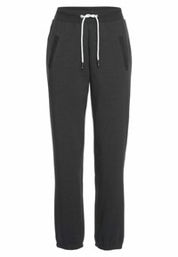 Zwarte sweatpants van een katoenmix, met een elastische tailleband met trekkoord, zijzakken en elastische boorden bij de enkels.