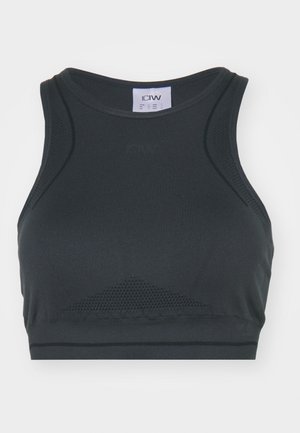 Soutien-gorge de sport noir en tissu extensible, doté d'un décolleté en scoop, de détails en mesh et d'une coupe ajustée pour un soutien optimal.