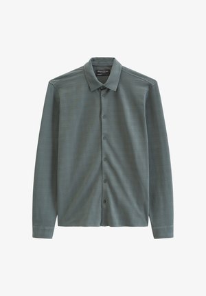 Langärmliges Hemd zum Knöpfen in gedämpftem Grün mit dezentem Karomuster, klassischem Kragen und geknöpften Manschetten.