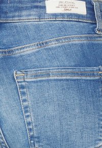 ONLY Petite Vaqueros bootcut - blue denim