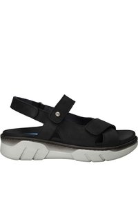 Sandale noire au fini en daim, avec des sangles ajustables, un design à bout ouvert et une semelle blanche épaisse pour un confort et une stabilité accrus.