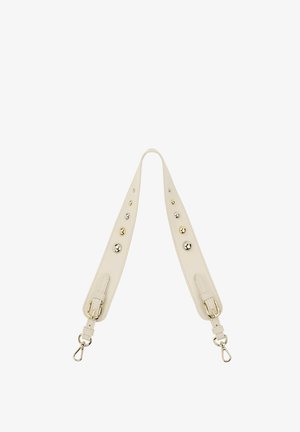Leren tasband in crèmekleur met zilveren en gouden hardware. Effen textuur met ronde studs langs de lengte. Verstelbare uiteinden.