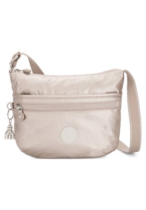 Beige nylon crossbody bag with a textured surface, featuring a front zipper pocket, subtle logo, and an adjustable strap.