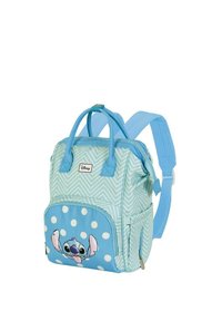 Mochila azul con patrón de zigzag y lunares, con un bolsillo frontal que tiene un personaje de dibujo animado. Dos mangos y correas ajustables.