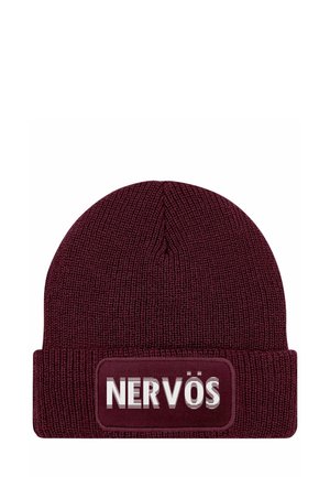 Maroon knitted beanie featuring a wide cuff and a rectangular patch with the word "NERVÖS" in white text. Soft texture, fitted design.
