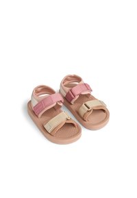 Πέδιλα με δύο λουριά σε ταμπά και ροζ χρώμα, με λαστιχένιες σόλες, υφή πέλματος και ρυθμιζόμενα κλείστρα Velcro. Διαθέτουν απαλές υφασμάτινες λεπτομέρειες.