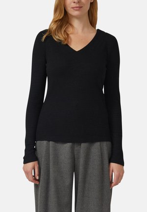 - Bluzka z długim rękawem