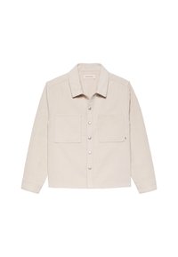 Camicia in corduroy beige con maniche lunghe, colletto a punta, due taschini sul petto e bottoni in argento. Presenta un sottile accento del logo sulla tasca.