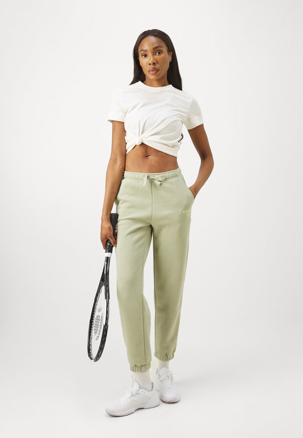 ESSENTIAL SWEATPANTS - Tracksuit bottoms - tea2