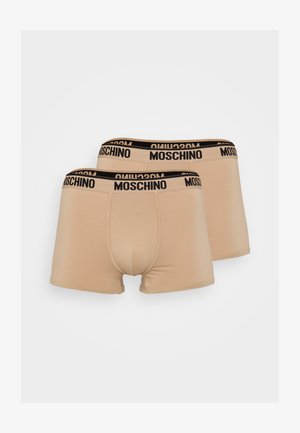 Beige boxershorts med en svart Moschino-logo på midjebåndet. Laget av et glatt og stretchy materiale. Har en formsydd pose og en mid-lengde klipp.