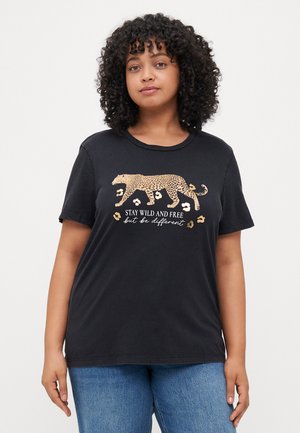 Black cotton T-shirt with a short sleeve design, featuring a gold leopard print and text reading "STAY WILD AND FREE but be different."
