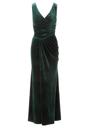 Emerald green velvet gown with a V-neck, sleeveless design, draped waist, and a floor-length skirt featuring pleated detailing.