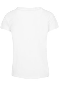 T-shirt en coton blanc à manches courtes, avec un col rond et une texture lisse, présentant un dos uni sans logos ni motifs apparents.