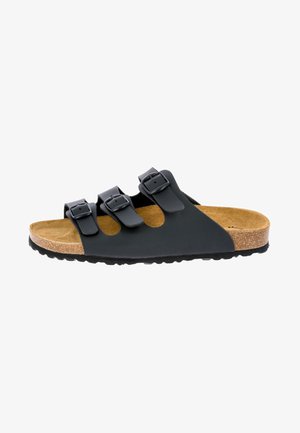 Black slide sandal with three adjustable straps, cork footbed, textured rubber sole, and smooth synthetic upper material.