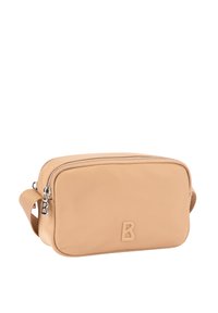 Bež pravokotni torbici iz gladkega materiala, z reliefnim sprednjim črko "B", srebrnim zadrgo in nastavljivim teksturiranim trakom.