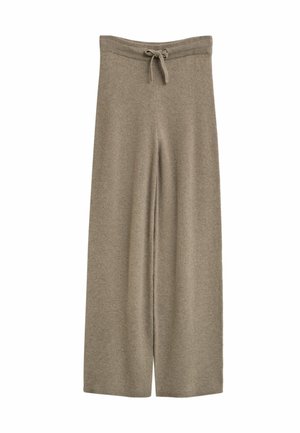 Wijde beige gebreide broek met ribgebreide tailleband en trekkoordsluiting, gemaakt van een zachte, comfortabele stof.